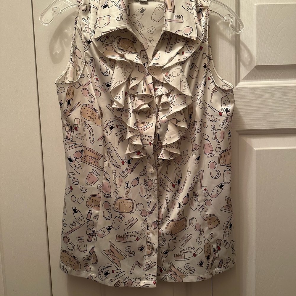 Tahiri Silky Slvless Top w 5 Buttons P/Small. Worn once & like new & comfy. Nice